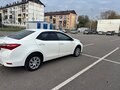 2013 Toyota Corolla XI (E160, E170, E180), белый, 1050000 рублей - вид 2
