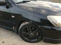2006 Mitsubishi Lancer IX Рестайлинг, чёрный, 450000 рублей - вид 2