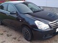 2014 Nissan Almera III (G15), чёрный, 560000 рублей - вид 2