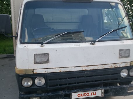 1990 Nissan Atlas, белый, 630000 рублей, вид 2