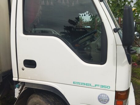 1995 Isuzu Elf (N-series), белый, 950000 рублей, вид 4