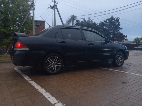 2005 Mitsubishi Lancer IX, чёрный, 450000 рублей - вид 3