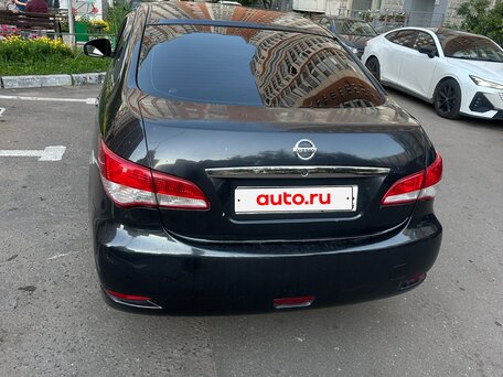 2013 Nissan Almera III (G15), чёрный, вид 2