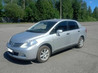 2009 Nissan Tiida Latio I, серебристый, 600000 рублей, вид 1