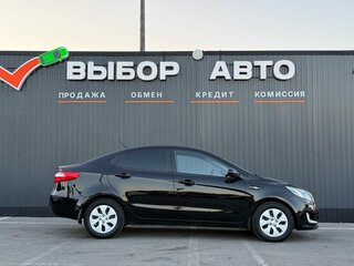 2013 Kia Rio 4-speed III, чёрный, 939000 рублей, вид 3