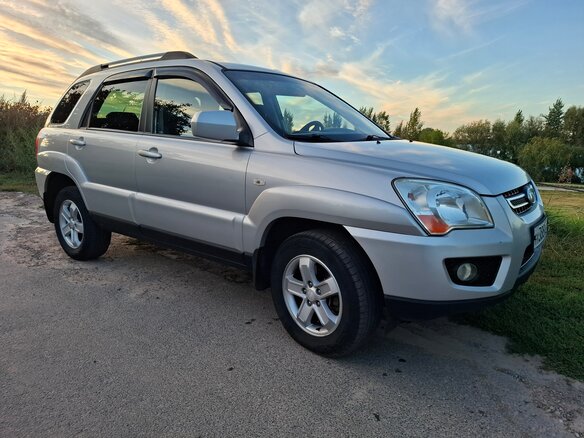 2010 Kia Sportage II Рестайлинг, серебристый - вид 2