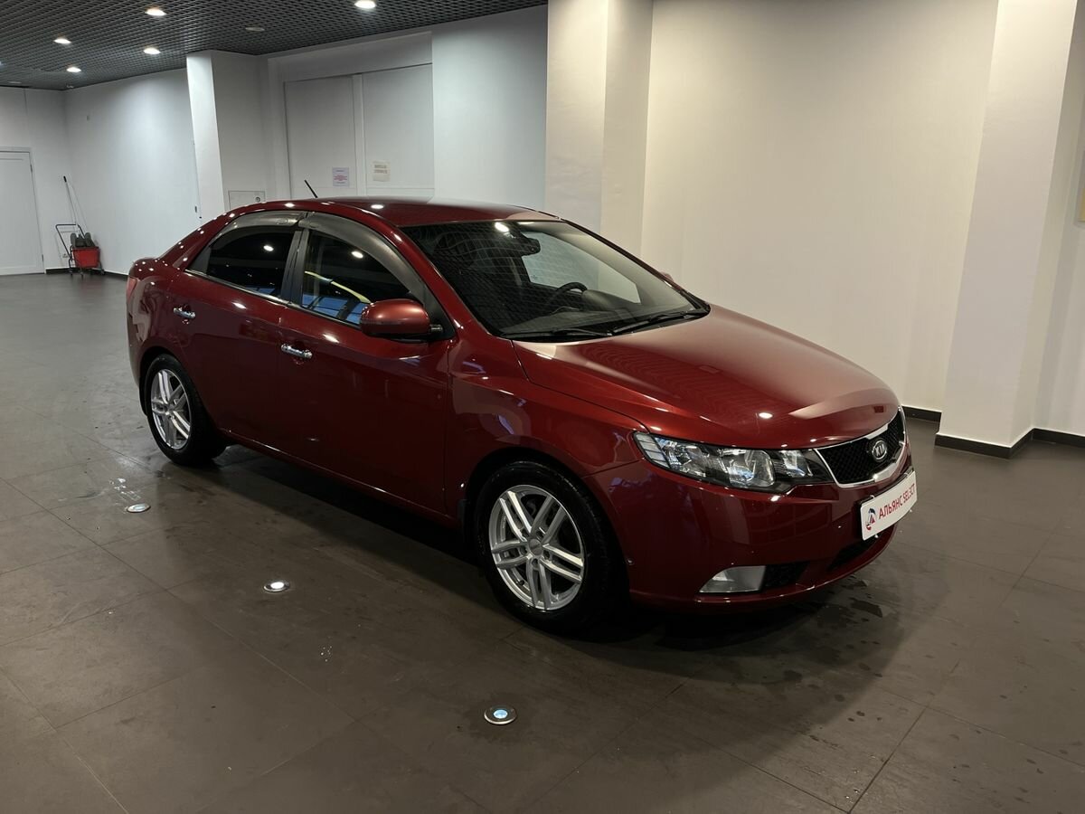 Открыть фотографии: Kia Cerato II