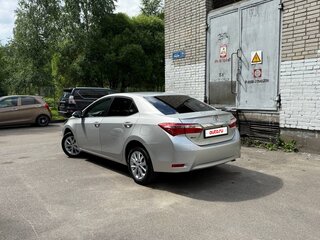 2014 Toyota Corolla XI (E160, E170, E180), серебристый, 1275000 рублей, вид 4