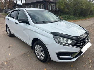 2024 Lada (ВАЗ) Vesta I Рестайлинг (NG), белый, 620000 рублей, вид 1