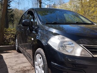 2010 Nissan Tiida I Рестайлинг, чёрный, 730000 рублей, вид 2