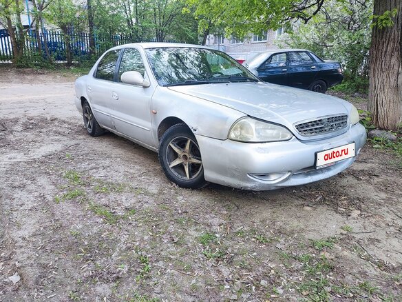 1999 Kia Clarus II, серый, 97000 рублей - вид 2
