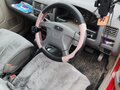 1999 Mazda Demio I (DW), красный, 200000 рублей - вид 5