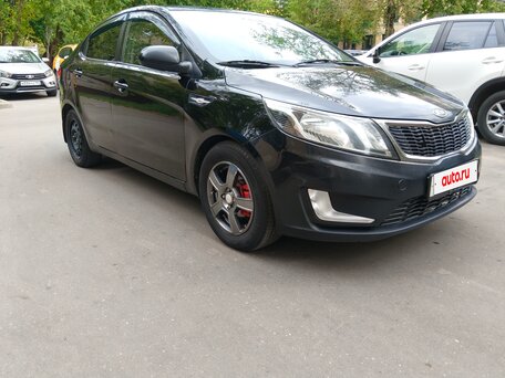 2012 Kia Rio 4-speed III, чёрный, 620000 рублей, вид 4