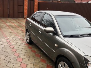 2011 Kia Rio II Рестайлинг, серебристый, 650000 рублей, вид 2