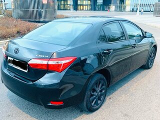 2014 Toyota Corolla XI (E160, E170, E180), чёрный, 1000000 рублей, вид 5