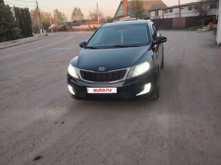 2011 Kia Rio 5-speed III, чёрный, 800000 рублей, вид 2