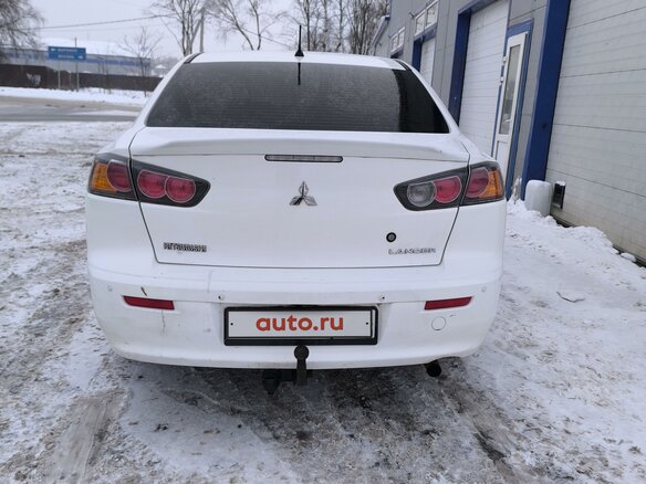 2013 Mitsubishi Lancer X Рестайлинг, белый - вид 2