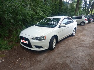 2011 Mitsubishi Lancer X Рестайлинг, белый, 750000 рублей, вид 1