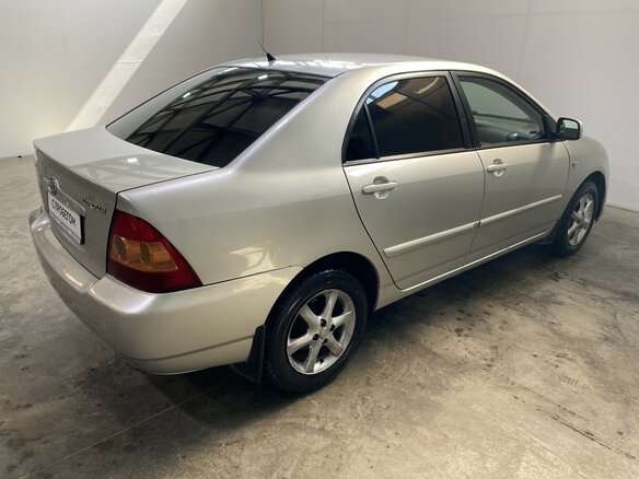 2006 Toyota Corolla IX (E120, E130) Рестайлинг, серебристый - вид 3