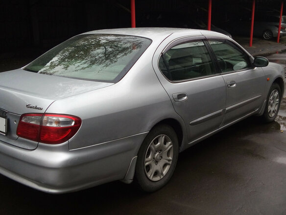 1999 Nissan Cefiro III (A33), серебристый - вид 2