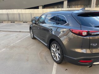 2021 Mazda CX-9 II Рестайлинг, коричневый, 3850000 рублей, вид 4