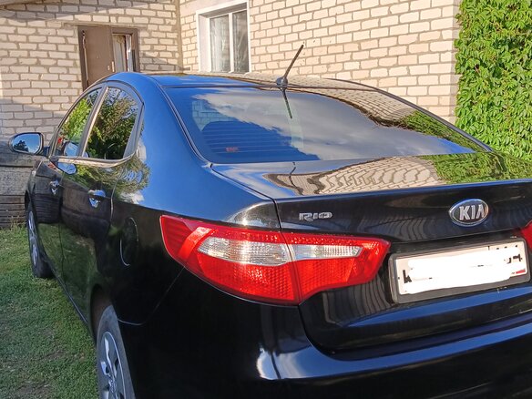 2013 Kia Rio 5-speed III, чёрный, 800000 рублей - вид 7
