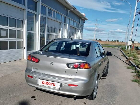 2014 Mitsubishi Lancer X Рестайлинг, серебристый, 870000 рублей - вид 4