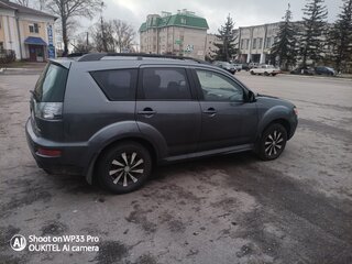 2011 Mitsubishi Outlander II Рестайлинг, серый, 900000 рублей, вид 3
