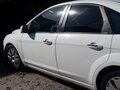 2010 Ford Focus II Рестайлинг, белый - вид 4