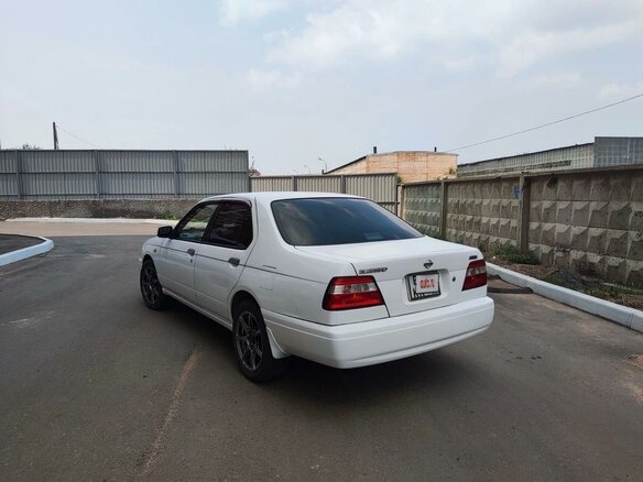 1998 Nissan Bluebird QG18 XI (U14), белый, 400000 рублей - вид 11