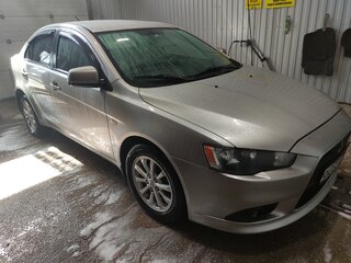 2012 Mitsubishi Lancer X Рестайлинг, серебристый, 830000 рублей, вид 1