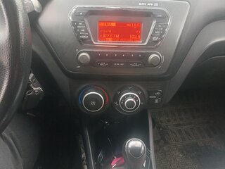 2012 Kia Rio 4-speed III, чёрный, 645000 рублей, вид 5
