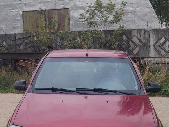 2010 Renault Logan I Рестайлинг, красный, 425000 рублей - вид 1