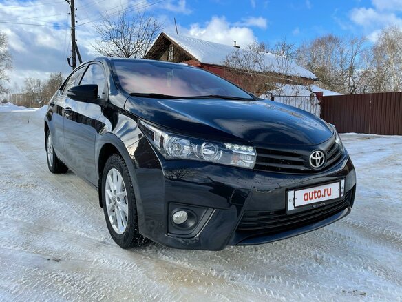 2013 Toyota Corolla XI (E160, E170, E180), чёрный - вид 1