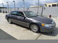 2000 Lincoln Town Car III, серый - вид 1