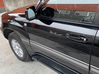 2004 Toyota Land Cruiser 100 Series Рестайлинг 1, чёрный, 3300000 рублей, вид 2