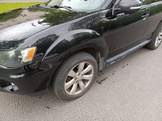 2010 Mitsubishi Outlander II Рестайлинг, чёрный, 900000 рублей, вид 2
