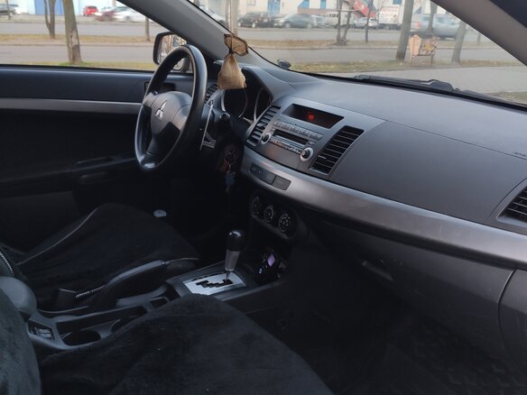 2008 Mitsubishi Lancer X, красный - вид 5