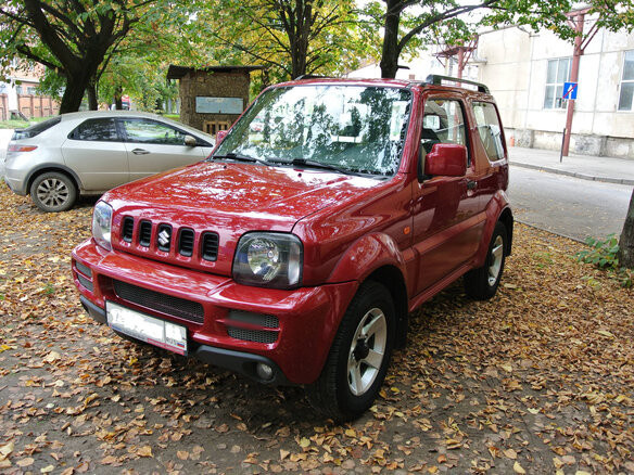 2011 Suzuki Jimny III Рестайлинг 1, красный - вид 11