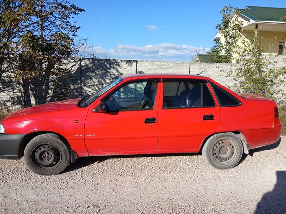 2012 Daewoo Nexia I Рестайлинг, красный, 500000 рублей - вид 2
