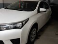 2014 Toyota Corolla XI (E160, E170, E180), белый, 1690000 рублей - вид 2