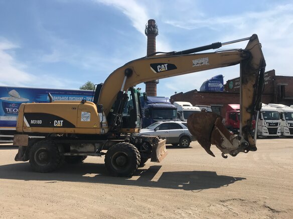 2013 Caterpillar M317, жёлтый - вид 3