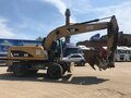 2013 Caterpillar M317, жёлтый - вид 3