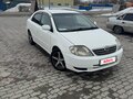 2002 Toyota Corolla IX (E120, E130), белый, 385000 рублей - вид 1
