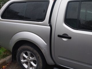2007 Nissan Navara (Frontier) III (D40), серебристый, 850000 рублей, вид 2
