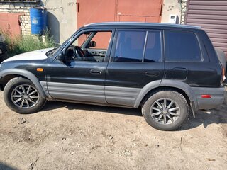 1996 Toyota RAV4 I (XA10), чёрный, 390000 рублей, вид 2