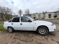 2009 Daewoo Nexia I Рестайлинг, белый, 180000 рублей - вид 2