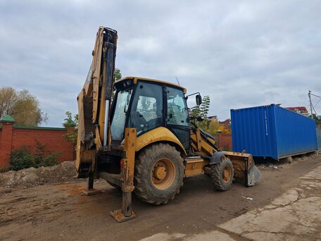 2011 Caterpillar 428, жёлтый, 4300000 рублей, вид 2