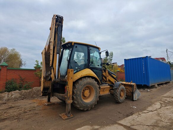 2011 Caterpillar 428, жёлтый, 4300000 рублей - вид 1