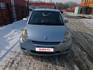 2009 Toyota Passo I (C10), серебристый, 280000 рублей, вид 2